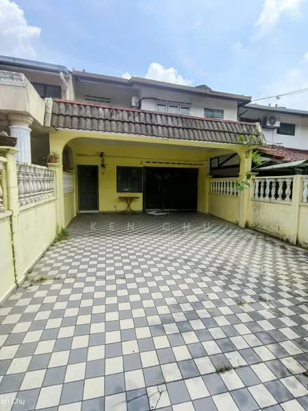 Exterior type: linked terrace house; features: covered car porch, checkerboard patterned flooring, yellow painted facade, sloping tiled roof, exterior wall with decorative railing, manicured garden area, windows with grilles, surrounding greenery; style: modern.