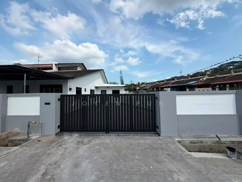 Exterior features: black metal gate, concrete driveway, white painted walls, grey painted walls, roof overhang, surrounding residential buildings, clear blue sky; style: modern.
