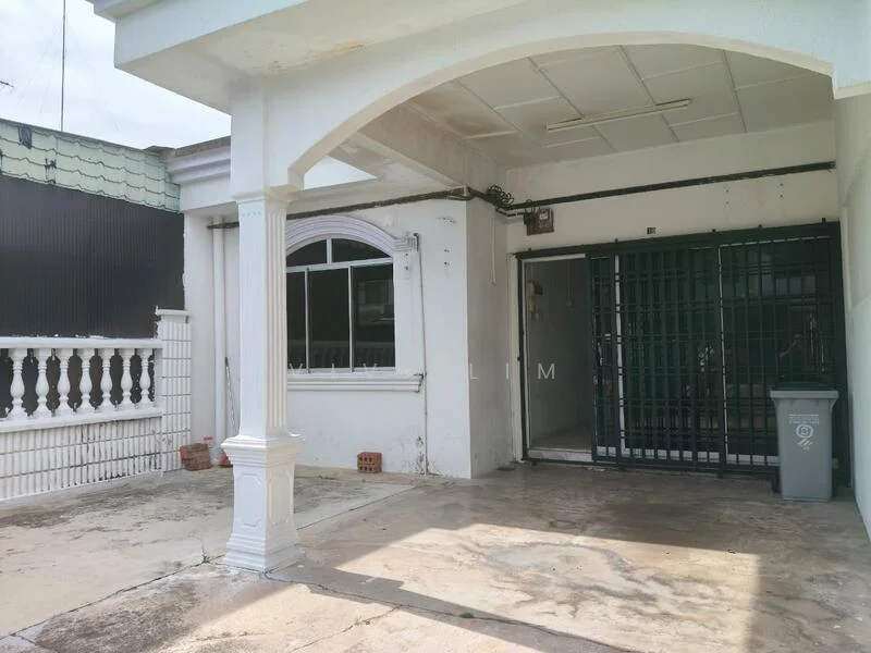 Exterior type: semi-detached house; features: white painted facade, arched entrance, front porch area, single-storey, grilled security door, large window with arch, concrete flooring, manicured lawn area, exposed brick wall, gated entrance; style: modern.