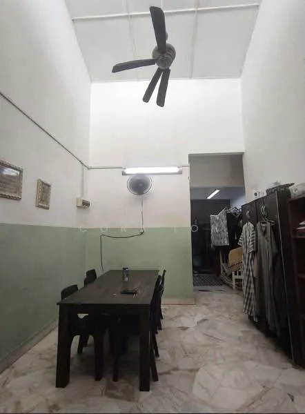 Dining features: marble flooring, white painted walls, green painted accent wall, 5-blade ceiling fan, wall-mounted air conditioning unit, dining table with 6 chairs, hanging light fixture, open space layout.