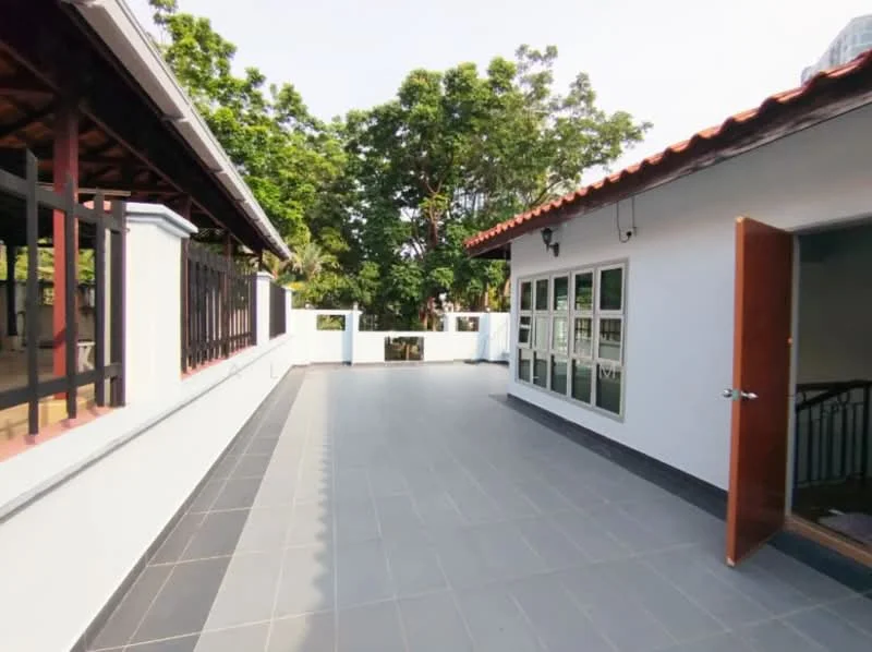 Exterior features: flat roof, grey tiled flooring, white painted walls, wooden eaves, surrounded by greenery, open terrace area, sliding glass door, wooden door, staircase visible; style: modern.