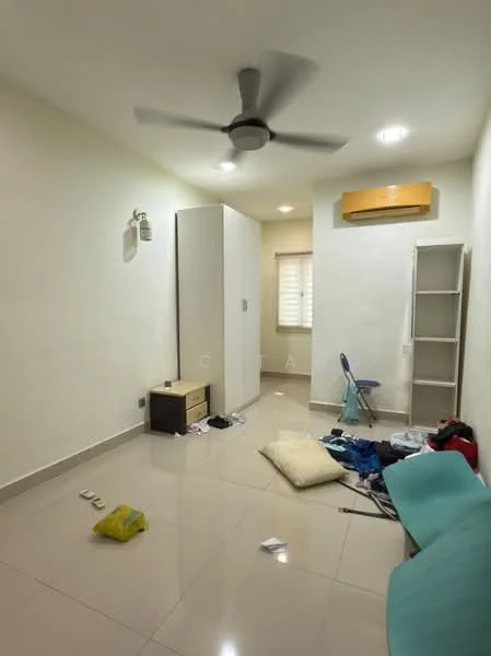 Room features: white painted walls, glossy tile flooring, ceiling fan, window with blinds, built-in wardrobe, shelf unit, small bedside table, messy floor with scattered items.