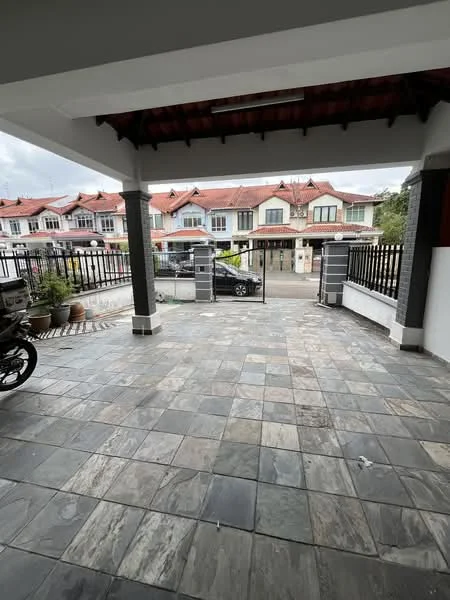 Exterior type: linked terrace house; features: paved stone flooring, covered porch area, metal gate, brick fence, surrounding residential buildings, car parked in driveway, gabled roof, overhead eaves; style: modern.