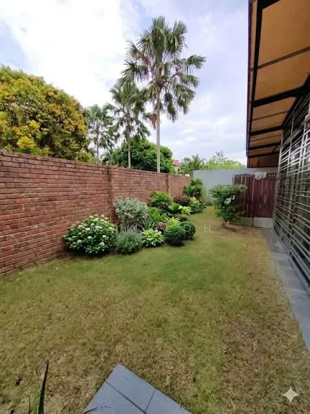 Exterior type: landscape garden; features: brick wall, manicured lawn, tropical landscaping, palm trees, flowering shrubs, hedges, stone-paved walkway, garden area with greenery; style: tropical-modern.