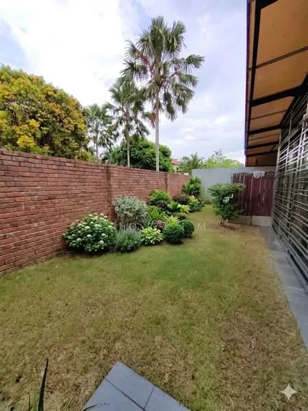 Exterior type: landscape garden; features: brick wall, manicured lawn, tropical landscaping, palm trees, flowering shrubs, hedges, stone-paved walkway, garden beds; style: tropical-modern.