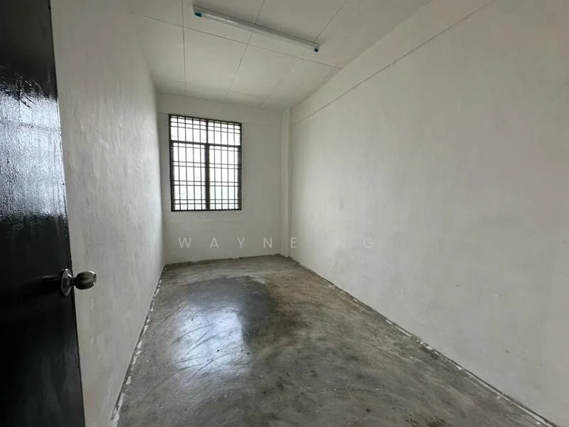 Room features: white painted walls, concrete flooring, single window with grid pattern, no visible ceiling features, no visible lighting fixtures, no furniture or decor; style: minimalist.