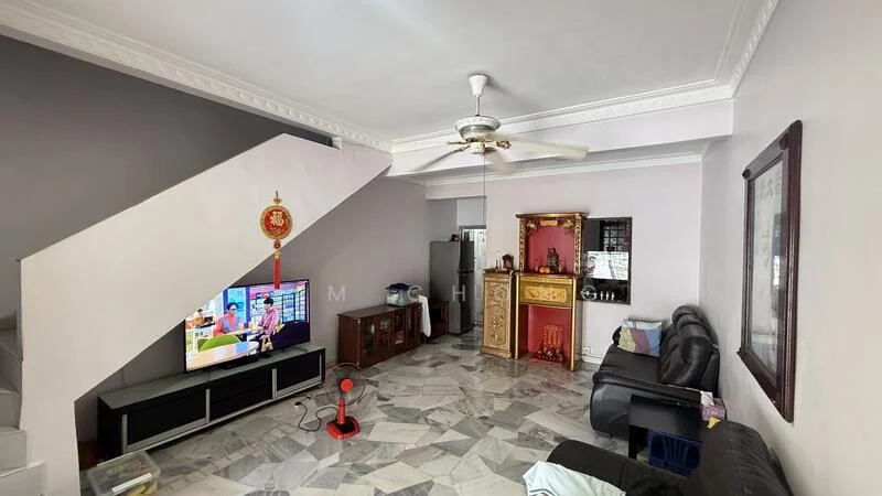 Living features: grey leather sofa, 3-seater sofa, coffee table, TV console, wall-mounted TV, marble flooring, ceiling fan, decorative wall mirror, wall-mounted decorative shelf, staircase with white railing, light purple painted walls, small decorative altar; style: contemporary.