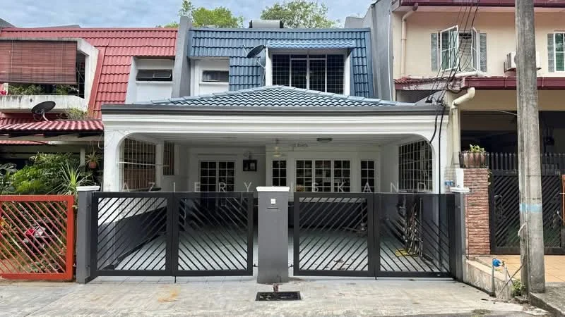 Exterior type: linked terrace house; features: grey tiled roof, white painted facade, black metal gate, covered car porch, front porch with tiled flooring, two-storey structure, window grilles, brick feature wall, mature trees in background, red painted fence, front garden area; style: modern.