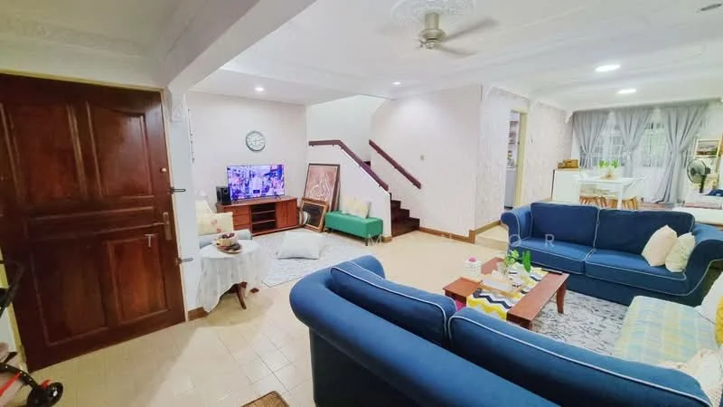 Living features: blue fabric sofa, 2-seater sofa, coffee table, area rug with geometric pattern, wall-mounted TV, wooden TV console, ceiling fan, decorative wall clock, framed artwork, light-colored walls, tile flooring, dining area visible in background, staircase in background; style: contemporary.