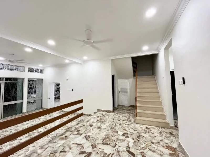 Living features: marble tile flooring, white painted walls, tray ceiling, 5-blade ceiling fan with light, staircase leading to upper floor, wooden railing, large windows with decorative grills, recessed downlights; style: modern.