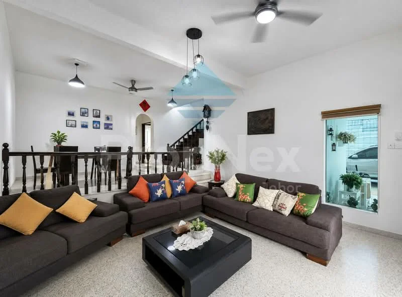 Living features: 3-seater fabric sofa in grey, 2-seater fabric sofa in grey, decorative cushions in various colors, coffee table with black surface, area rug on flooring, ceiling fan with light, recessed downlights, wall-mounted artwork, potted plants, staircase in background, window with sheer curtains, wooden railing; style: modern.