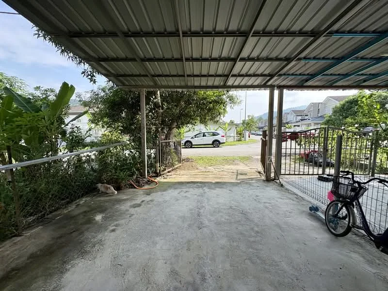 Exterior type: car porch; features: metal roof, concrete flooring, fenced area, surrounded by greenery, open space, driveway access, visible street view, bicycle parked, pet visible; style: modern.