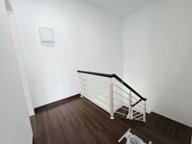 Room features: white painted walls, wooden flooring, metal railing, staircase, wall-mounted electrical panel; style: modern.