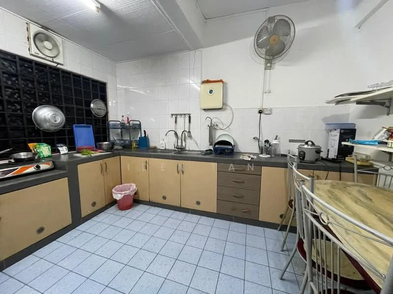 Kitchen features: L-shaped kitchen layout, light brown cabinetry, white tiled backsplash, stainless-steel sink, chrome faucet, built-in stove, microwave, rice cooker, kettle, refrigerator, exhaust fan, plastic trash bin, white tiled flooring, ceiling fan; style: functional.