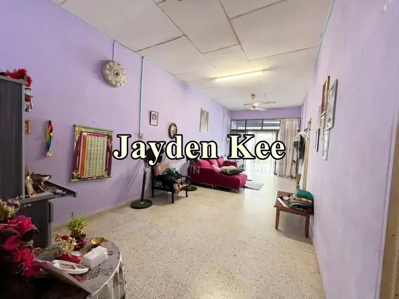 Living features: purple painted walls, exposed ceiling with tiles, ceiling fan, light-colored flooring, sofa in maroon, decorative wall art, small side table, floor lamp, potted plants, open layout, window with natural light.