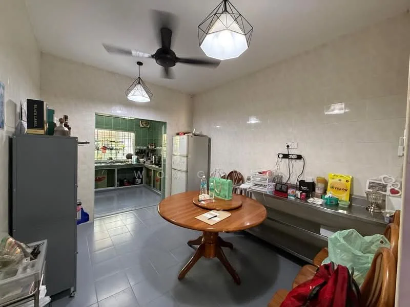 Kitchen features: grey tiled flooring, white painted walls, ceiling fan, two pendant lights, round wooden dining table, grey storage cabinet, stainless-steel fridge, open shelving, kitchen countertop, various kitchen appliances and utensils; style: modern.