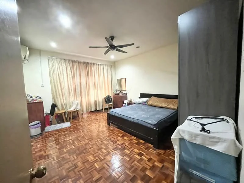 Bedroom features: parquet wood flooring, cream painted walls, 5-blade ceiling fan with light, floor-to-ceiling windows with sheer curtains, queen-size bed with brown bedding, wooden bedside tables, dressing table with mirror, built-in wardrobe, decorative wall mirror, laundry basket.