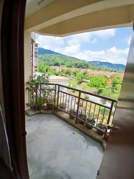 Room features: balcony, metal railing, concrete flooring, mountain view, potted plants, outdoor space, sunlight exposure, surrounding greenery; view: mountain.