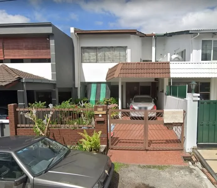 Exterior type: linked terrace house; features: white painted facade, brown tiled roof, brick fence with gate, paved driveway, manicured garden with plants, car porch with awning, large windows, front yard with greenery; style: modern.