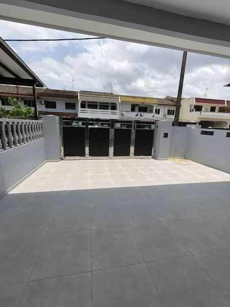 Exterior type: linked terrace house; features: paved driveway, grey tiled flooring, metal gate, surrounding walls, balustrade, outdoor space, clear sky, residential neighborhood; style: modern.