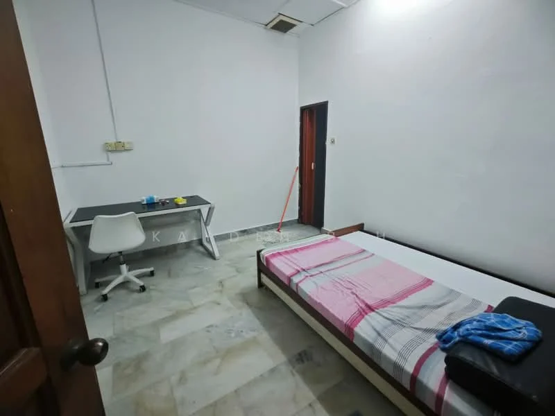 Bedroom features: single bed with pink and grey bedding, white desk with chair, marble flooring, white painted walls, ceiling with air vent, window with no visible treatment, built-in wardrobe, light fixture on ceiling; style: minimalist.