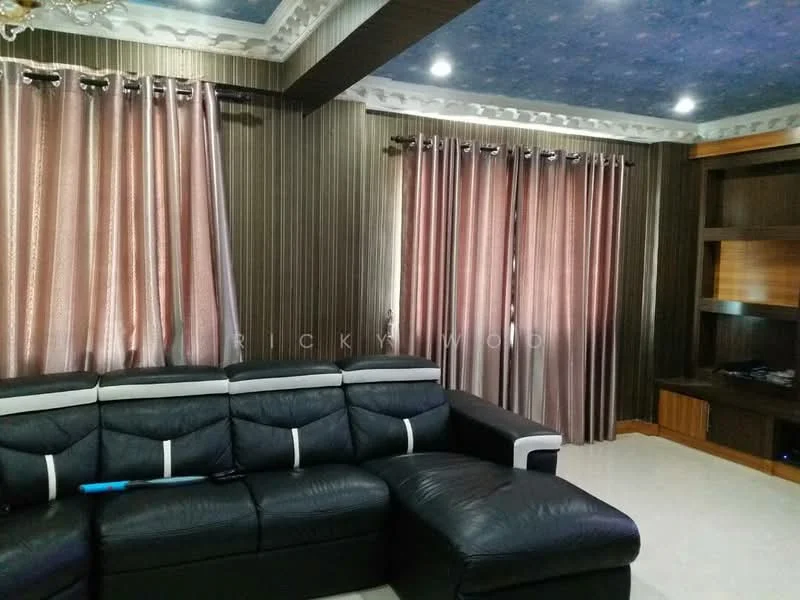 Living features: black leather sectional sofa, cream wall tiles, dark wood feature wall, recessed ceiling with decorative molding, blue patterned ceiling, floor-to-ceiling windows with sheer curtains, dark wood TV console, LED ceiling lights; style: modern.