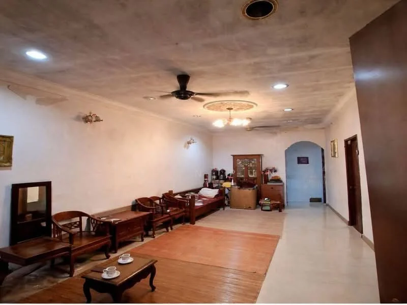 Living features: white painted walls, exposed ceiling with ceiling fan, recessed downlights, wooden flooring, 3-seater wooden sofa, 2-seater wooden sofa, wooden coffee table, decorative wall art, wooden console table, arched doorway, tile flooring in the entrance area; style: traditional.