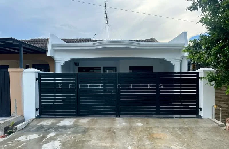 Exterior type: detached bungalow; features: black metal gate with horizontal slats, concrete driveway, white painted facade, decorative cornice at roofline, single-storey, landscaped front yard with greenery, covered porch area, roof overhang; style: modern.