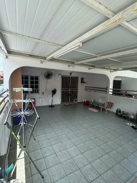 Room features: tiled flooring, white painted walls, metal ceiling, ceiling fan, clothes drying rack, outdoor seating, window with bars, decorative plants.