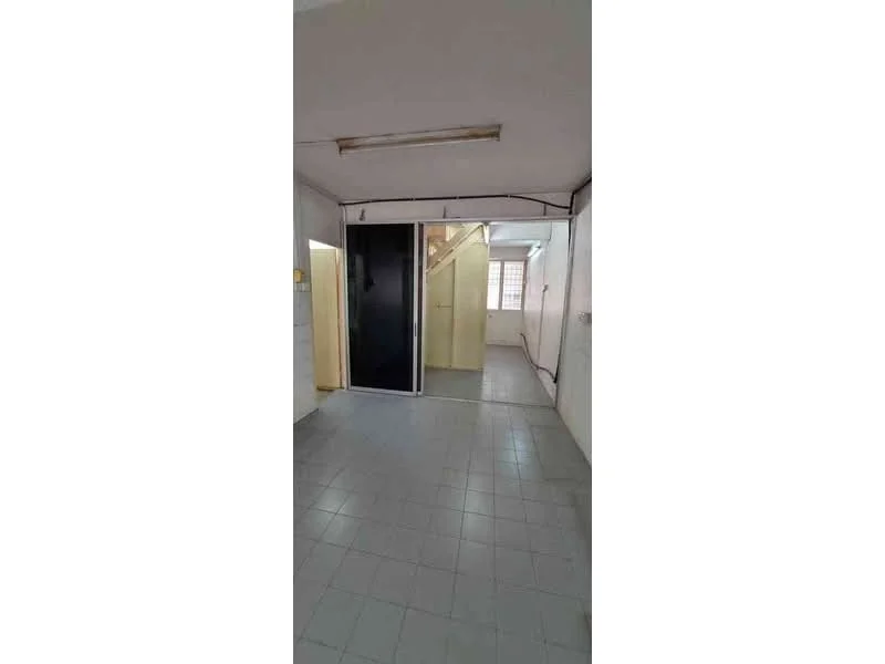 Room features: grey tiled flooring, white painted walls, sliding glass door, staircase visible, ceiling light fixture, window with natural light.