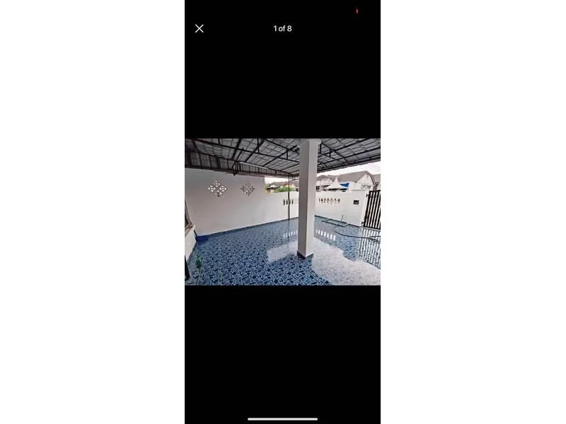 Exterior features: blue patterned tile flooring, white painted walls, covered roof, open space, fenced area, outdoor view, access to swimming pool; style: modern.