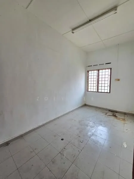 Room features: white painted walls, tile flooring, single window, natural light from window, ceiling light fixture, clean but unmaintained floor, no visible furniture, empty space.
