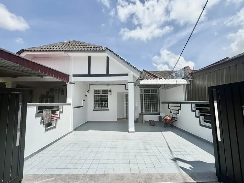 Exterior type: semi-detached house; features: white painted facade, black trim detailing, pitched tile roof, single-storey, tiled flooring in courtyard, front porch area, manicured landscaping, visible windows with grilles, gated entrance; style: modern.