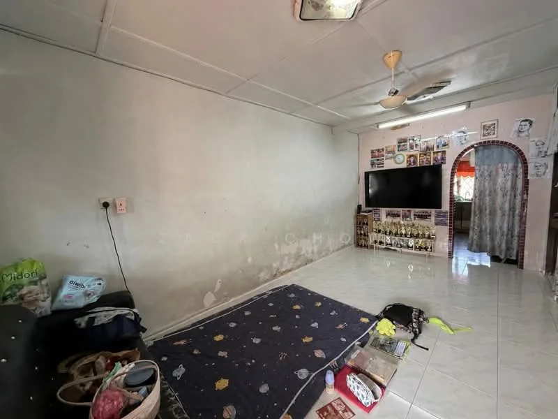 Living features: white painted walls, polished ceramic tile flooring, ceiling fan, wall-mounted TV, sofa, area rug with geometric pattern, decorative wall with photographs, curtains, open space layout.