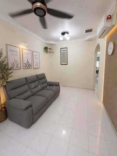 Living features: grey fabric reclining sofa, white tiled flooring, white painted walls, crown moulding, ceiling fan with light, wall-mounted air conditioning unit, decorative wall art, shelf with decorative plants, arched doorway, light fixture on ceiling; style: modern.