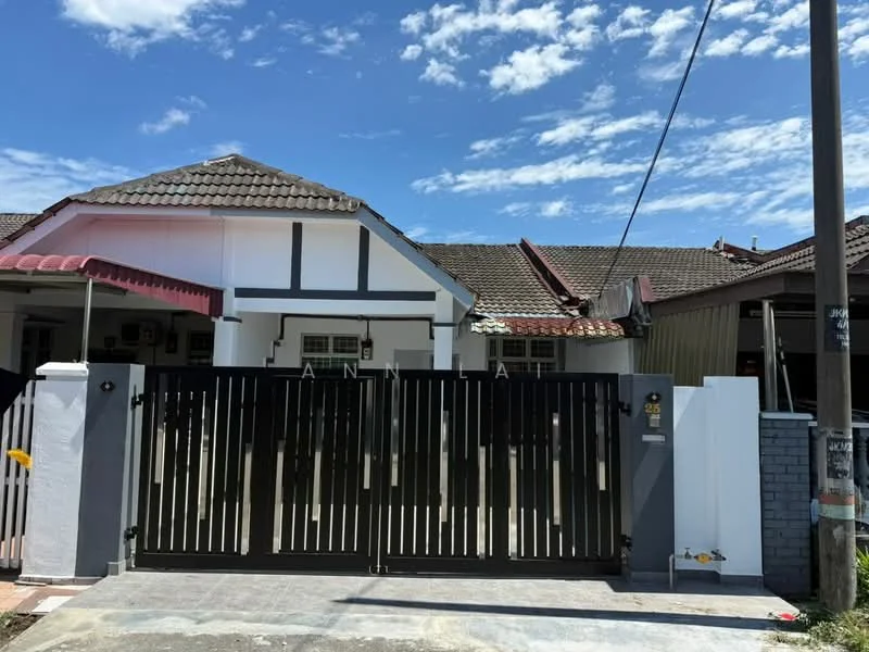 Exterior type: linked terrace house; features: black metal gate, white painted facade, brown tiled roof, decorative wooden beams, paved driveway, manicured lawn, surrounded by residential houses, clear blue sky; style: modern.