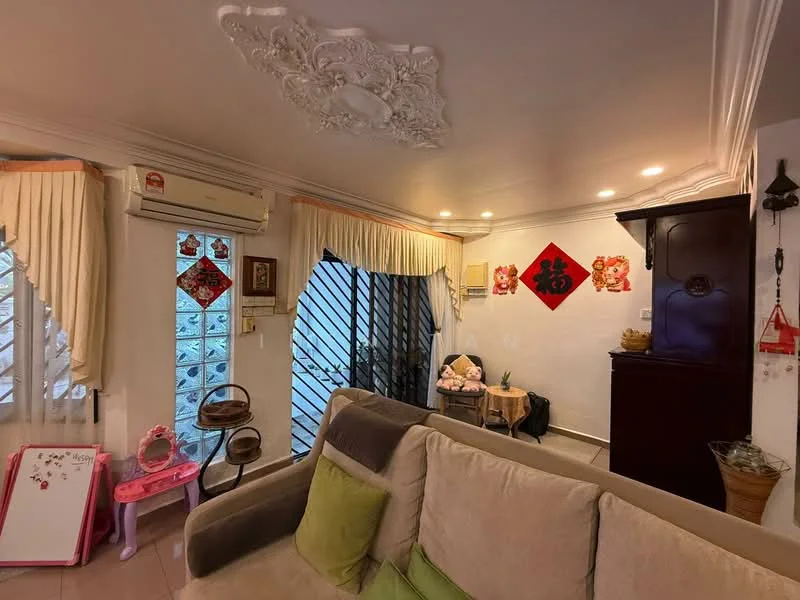 Living features: cream painted walls, tray ceiling with decorative moulding, recessed downlights, floor-to-ceiling windows with black metal grilles, light-colored tiled flooring, air conditioning unit on wall, decorative wall art, wooden cabinet, pink children's chair, small decorative items on shelves; style: traditional.