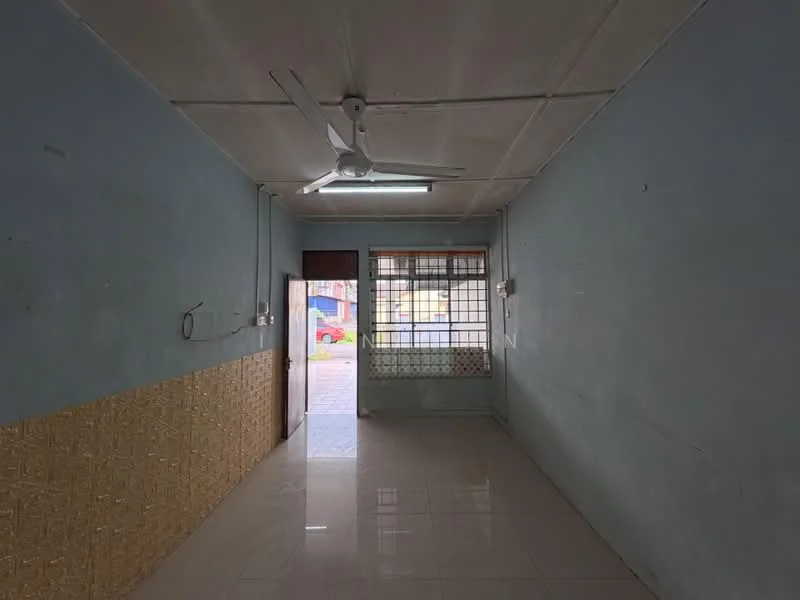 Room features: light blue painted walls, white ceiling, polished ceramic tile flooring, ceiling fan, window with grid pattern, door leading outside, wall-mounted electrical outlets, decorative wall paneling at lower section.