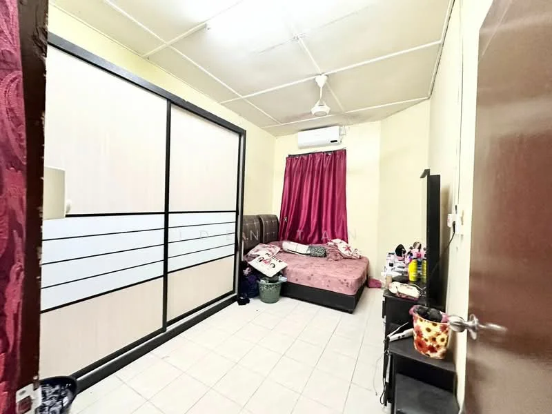 Bedroom features: queen-size bed with pink bedding, built-in wardrobe with sliding doors, wall-mounted split AC unit, curtains in dark pink, white painted walls, tile flooring, ceiling fan, nightstand with decorative items.