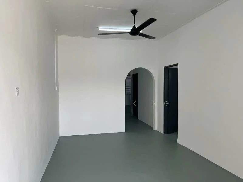 Room features: white painted walls, grey flooring, 5-blade ceiling fan, arched doorway, doorway leading to another room, fluorescent ceiling light; style: minimalist.