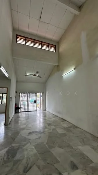 Room features: marble flooring, white painted walls, high ceiling, ceiling fan, large windows, security grille, fluorescent lighting, open layout; style: modern; view: garden.