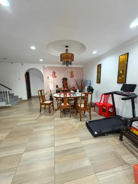 Dining features: round dining table, wooden dining chairs, chandelier, decorative wall art, treadmill, light-coloured tiled flooring, crown moulding on ceiling, wall-mounted air conditioning unit; style: modern. Room features: white painted walls, staircase visible in background.