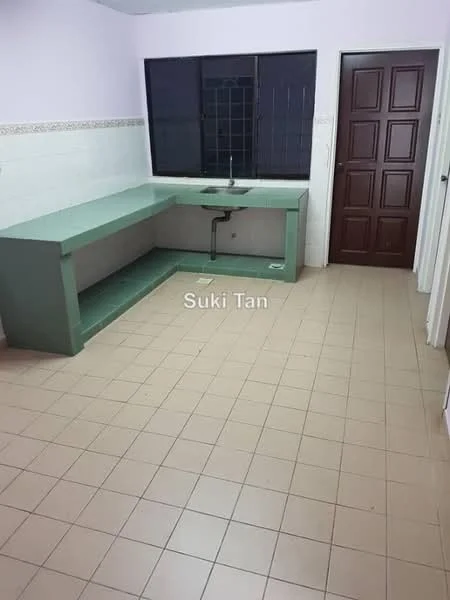 Kitchen features: green laminate countertop, single-bowl stainless-steel sink, wall-mounted faucet, white tiled backsplash, cream tiled flooring, built-in cabinetry, window with black grille, door leading to hallway.