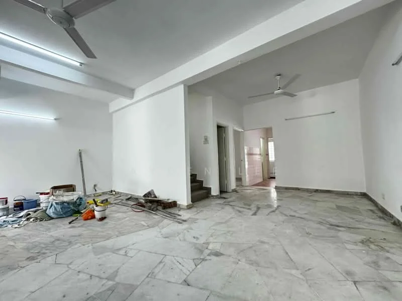 Room features: white painted walls, marble flooring, ceiling with recessed lighting, 2 ceiling fans, unfinished construction materials visible, open layout, natural light from windows, doorway leading to another room; style: modern.