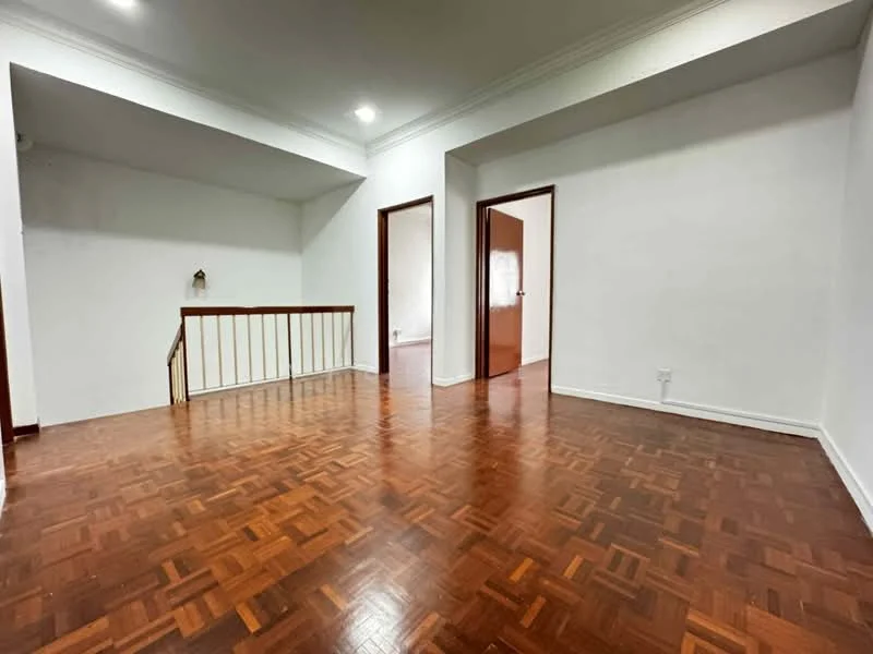 Living features: parquet wood flooring, white painted walls, crown moulding, recessed downlights, staircase with wooden railing, two doorways leading to other rooms.