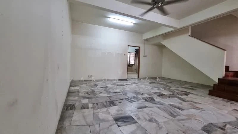 Room features: marble flooring, plain white walls, ceiling fan, staircase, window with natural light, light fixture on ceiling, open layout, no visible furniture.