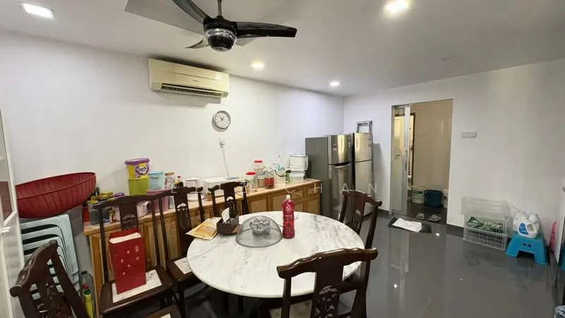 Dining features: round marble dining table, wooden dining chairs, wall-mounted split AC, white painted walls, grey tile flooring, kitchen cabinetry, stainless-steel fridge, clock on wall, plastic storage containers, cleaning supplies, open doorway to kitchen, flooring extends to kitchen area; style: modern.