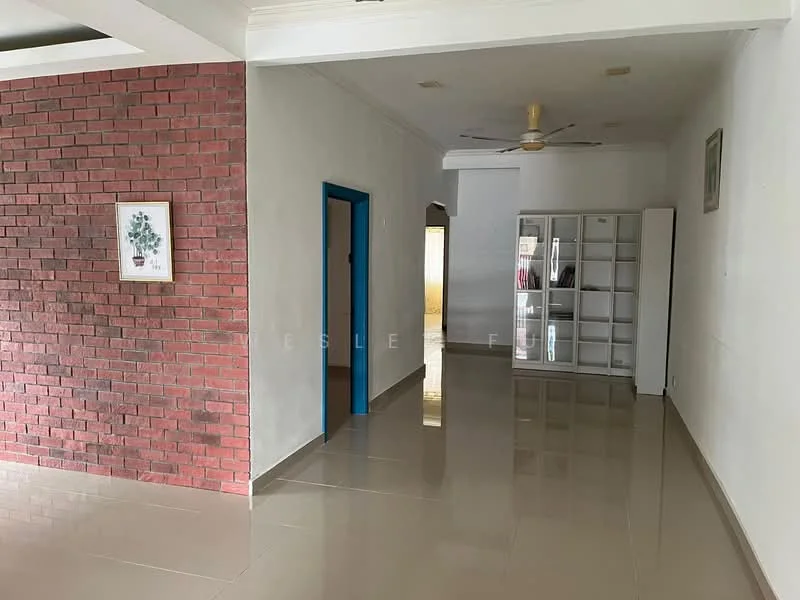 Room features: red brick accent wall, white painted walls, glossy beige tile flooring, ceiling fan, built-in shelving unit, doorway leading to another room, framed artwork on wall, natural light from windows; style: modern.