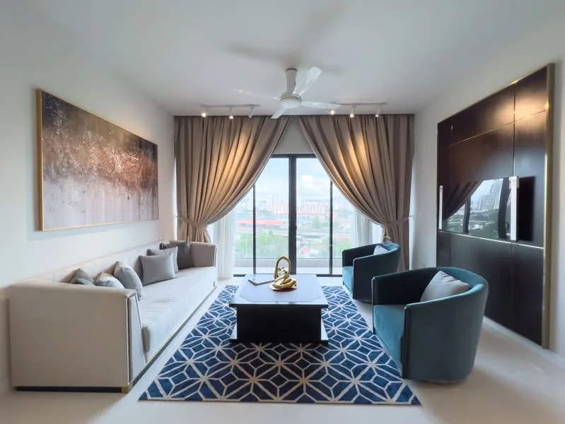 Living features: 3-seater fabric sofa in beige, 2 accent chairs in teal, coffee table with dark surface, area rug with geometric pattern, floor-to-ceiling windows, sheer curtains, drapes in light grey, wall-mounted TV, framed artwork on wall, recessed downlights, 5-blade ceiling fan with light; style: modern; view: city.
