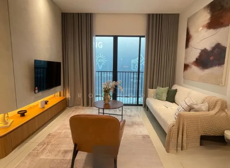Living features: light grey painted walls, white ceiling, floor-to-ceiling windows, sheer curtains, light wood TV console, wall-mounted TV, beige fabric sofa, decorative throw blanket, area rug with geometric pattern, coffee table, decorative vase with flowers, accent chair in tan leather, framed artwork on wall; style: modern.
